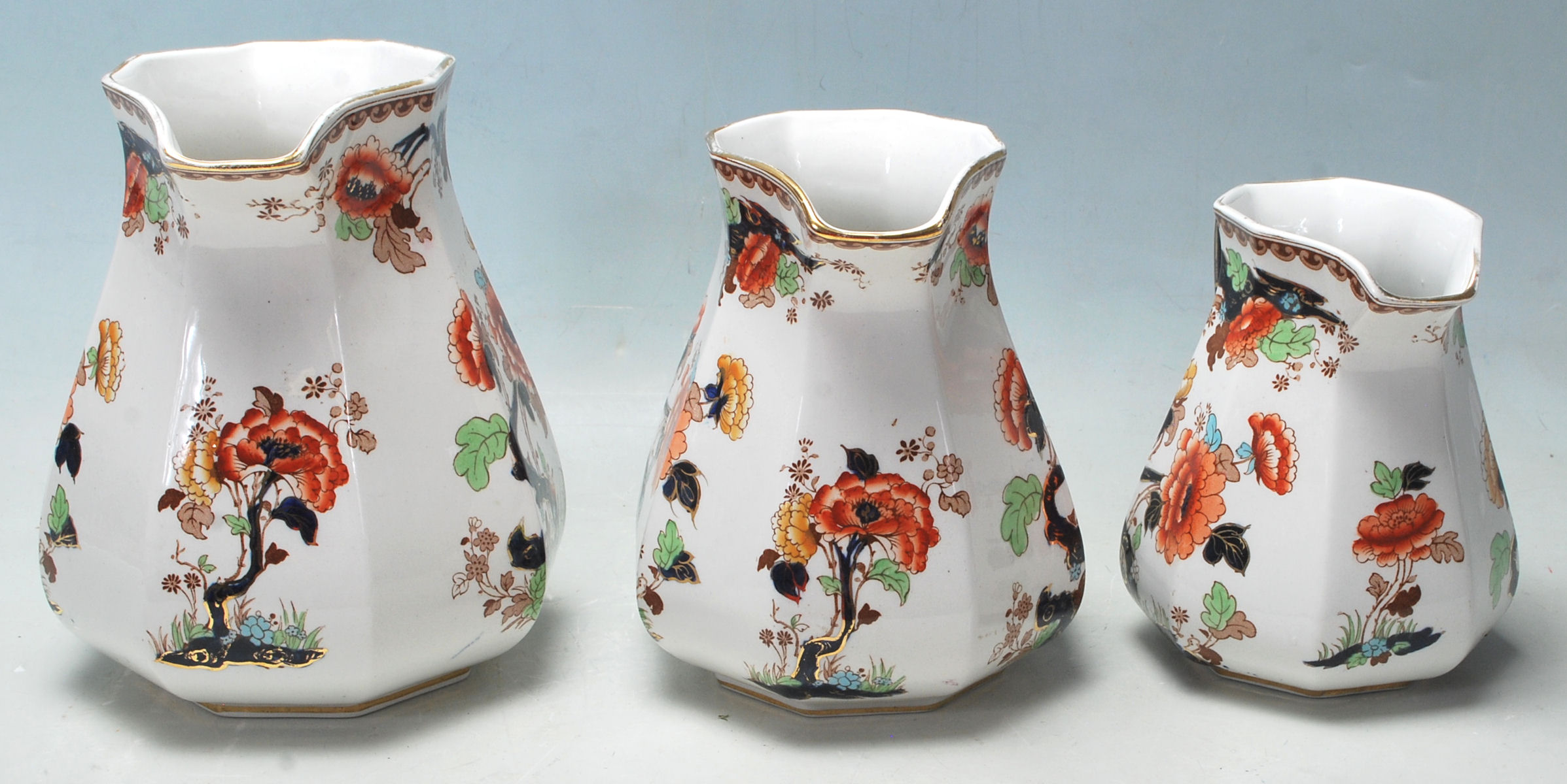 THREE GRADUATING VICTORIAN LOSOL WARE JUGS - Image 3 of 5