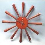 RETRO TEAK STARBURST WALL CLOCK