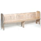 A 20TH OAK GOTHIC STYLE CHURCH PEW