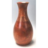 A RETRO HARD WOOD BALUSTER VASE