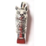 A STAMPED 925 SILVER RABBIT WHISTLE.