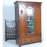 A 1930’S ART DECO JACOBEAN STYLE WARDROBE AND BED END