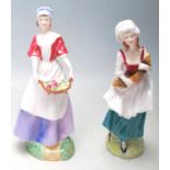 A PAIR OF ROYAL DOULTON CERAMIC FIGURINES