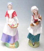 A PAIR OF ROYAL DOULTON CERAMIC FIGURINES