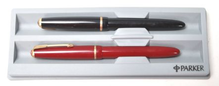 A PAIR OF BOXED PARKER FOUNTAIN PENS