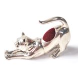 A STAMPED 925 STERLING SILVER PIN CUSHION IN THE FORM OF A STRETCHING CAT