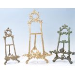 A pair of vintage 20th century Rococo style brass table easels having acanthus and scroll decoration