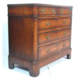 An early 19th century Georgian mahogany chest of drawers having two short drawers over three full