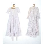 Two vintage 1970’s Laura Ashley dresses / long G maxi dresses gypsy style having purple floral