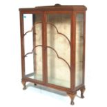 A 20TH CENTURY QUEEN ANNE CERAMIC DISPLAY CABINET