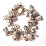 VINTAGE SILVER CHARM BRACELET