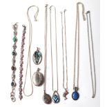 A collection of ladies silver jewellery to include a tennis bracelet set with purple stones, a