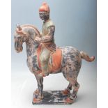 TANG DYNASTY STYLE HORSE AND RIDER STATUE
