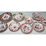 A large collection of 19th century and 20th century ironstone ceramic plates to include Amhers