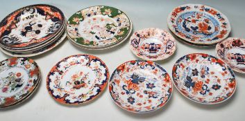 A large collection of 19th century and 20th century ironstone ceramic plates to include Amhers