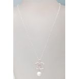 A STAMPED 925 SILVER CHANEL STYLE PENDANT NECKLACE SET WITH CUBIC ZIRCONIA