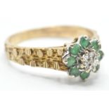 9CT GOLD AMD GREEN STONE CLUSTER RING