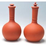 TWO POMPE TERRACOTTA LIDDED VESSELS