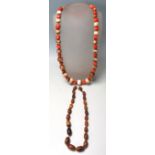TWO VINTAGE BEADED NECKLACES TO INCLUDE CORAL AND HORN