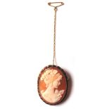 A hallmarked 9ct gold Cameo brooch carved with a female figure. Roller clap to verso. Total