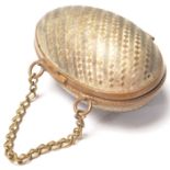 A vintage 20th century thimble case / penny purse in a shape of a egg with blue linen interior,