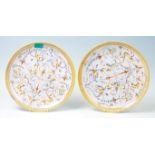 A pair of late 19th century Italian faience / majolica charger plates, hand painted in blue an