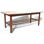 A RETRO MID CENTURY DANISH INSPIRED TEAK WOOD COFFEE TABLE