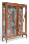 A 20TH CENTURY QUEEN ANNE CHINA DISPLAY CABINET.
