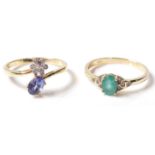 A pair of Gemporia 9ct gold rings. A Tanzanite and Diamond 9k gold ring having oval and rounded
