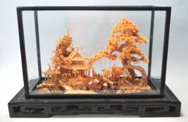 A mid 20th century antique style Chinese diorama depicting a Chinese rural view with typical scene