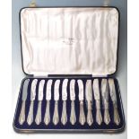 CASED SET OF 1930'S WALKER AND HALL SILVER TABLE KNIVES