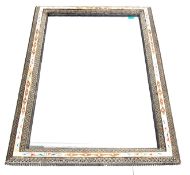 An unusual Moorish - Moroccan wall mirror having a