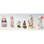 A COLLECTION OF BESWICK CLOWNS, RABBIT, PIG,AND BIRS