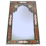 An unusual Moorish - Moroccan wall mirror having a