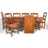 A FARMHOUSE CONTRY SIDE OAK REFECTORY TABLE AND CHAIRS