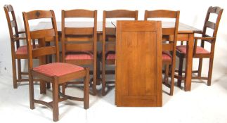 A FARMHOUSE CONTRY SIDE OAK REFECTORY TABLE AND CHAIRS