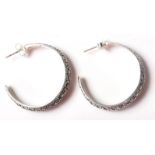 A PAIR OF STAMPED 925 SILVER HOOP EARRINGS SET WITH MARCASITES.