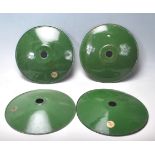 A set of four vintage 20th century factory industrial desk lights the shades finished in green a