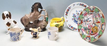 A collection of antique ceramic items to include a