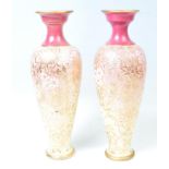A pair of early 20th Century ceramic Slaters patent vases of shouldered circular form, decorated