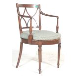 A 19th Century Victorian mahogany bedroom carver chair having a curved cross stretch back with