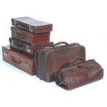 A COLLECTION OF RETRO BROW BRIEFCASE/ LUGGAGE