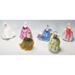 A group of six Royal Doulton ceramic figurines to include Simone HN2378, Charlotte HN2421, Buttercup