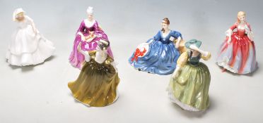 A group of six Royal Doulton ceramic figurines to include Simone HN2378, Charlotte HN2421, Buttercup