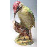 BESWICK CERAMIC WOOD PECKER FIGURINE