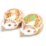 A pair of Royal Crown Derby paperweights to include Ivy Hedgehog and Holly Hedgehog, each with a