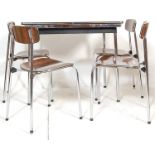 An original  retro 1970's Belgian Tavo dining table raised on chrome supports with extending table