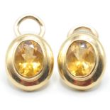 PAIR OF LADIES 9CT GOLD AND ORANGE STONE CLIP ON EARRINGS