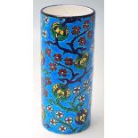 A FRENCH LONGWY CERAMIC VASE OF A CYLINDRICAL FORM WITH FLORAL