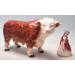 MELBA PORCELAIN COW FIGURINE & ROYAL DOULTON LADY FIGURINE